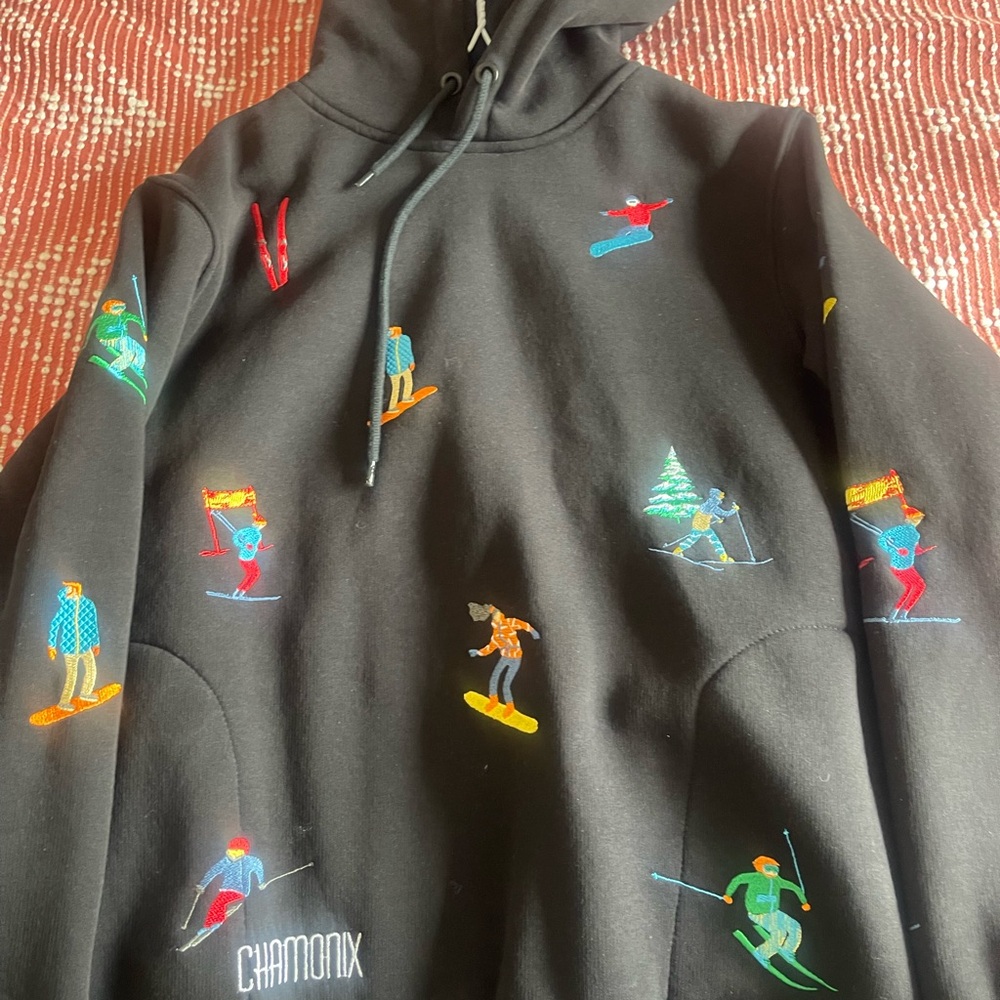 Black Hoodie with Vibrant Skier Embroidery